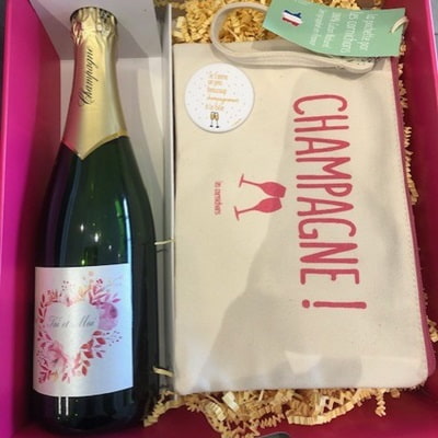 Cadeau original pour la Saint Valentin Champagne et pochette de voyage
